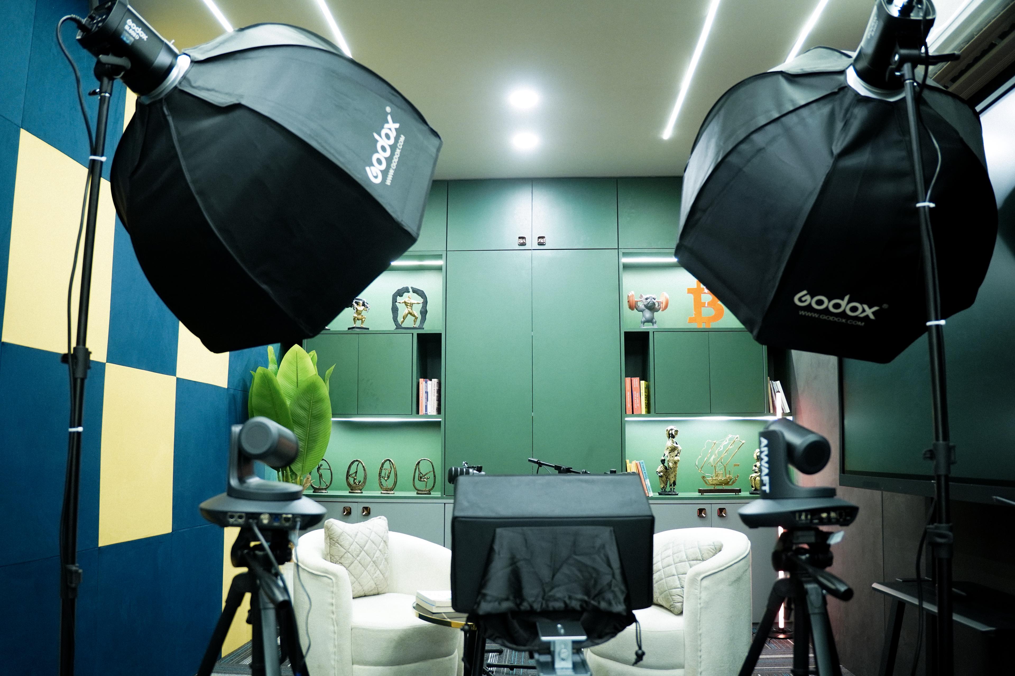 Mark8 Production podcast studio with professional Godox lighting setup